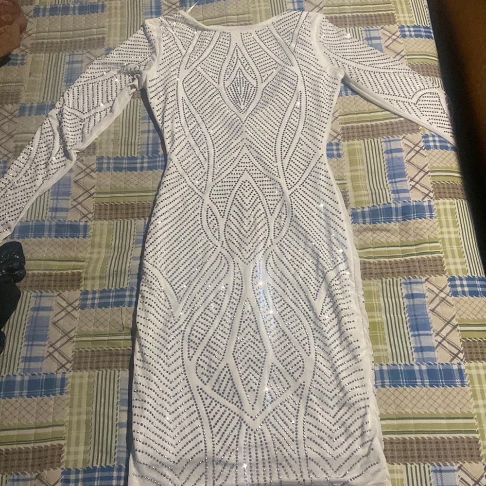 . Was worn once to take pictures and took it off and was washed right after.